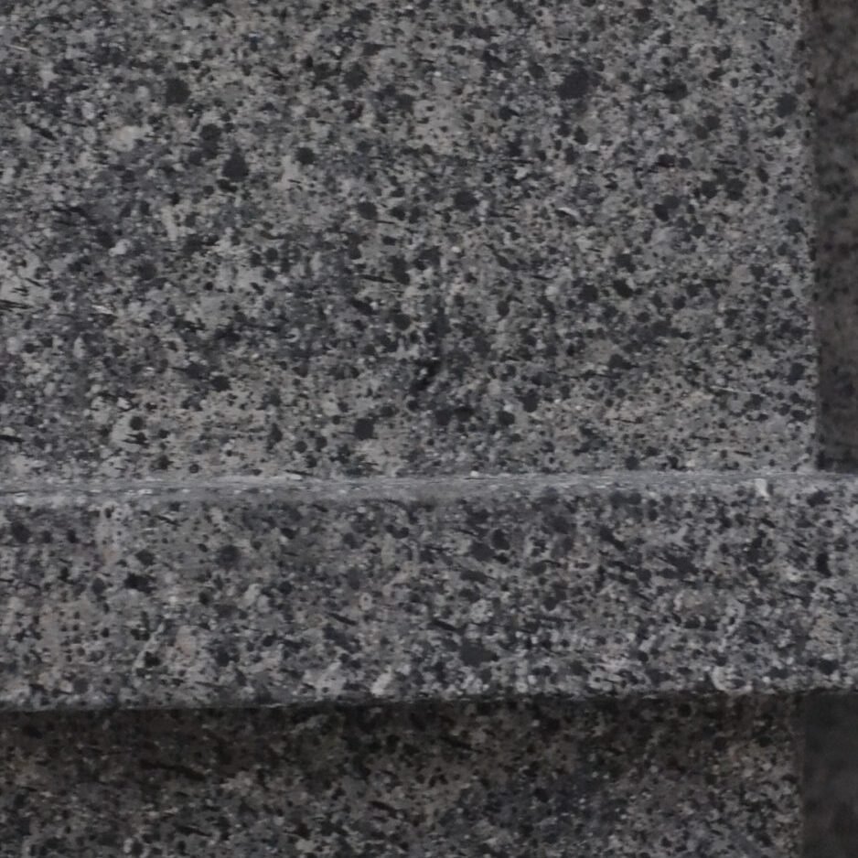 Gros plan sur une surface de granit… ou de peinture